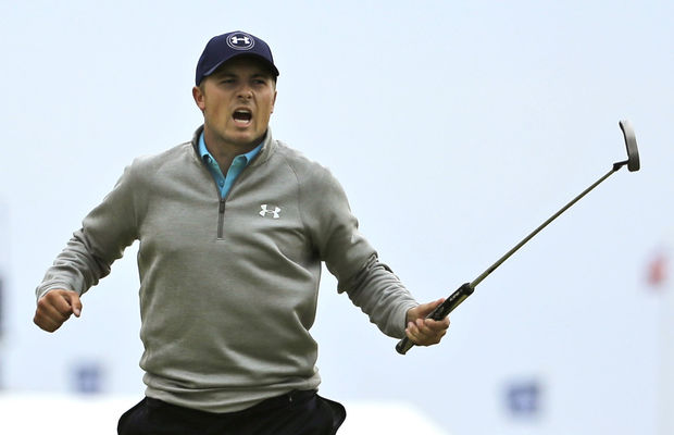 In this July 20, 2015, file photo, Jordan Spieth reacts after a birdie on the 16th hole during the final round at the British Open Golf Championship at the Old Course in St. Andrews, Scotland. Spieth, whose Grand Slam bid ended at the British Open by one shot, wants to treat his final six events of the season as if he were starting over. He plays the Bridgestone Invitational this week in Akron, Ohio, and next week at the PGA Championship can become the first player to sweep the American majors.(AP Photo/David J. Phillip)