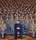 Kim Jong-un poses with North Korean military. (KCNA/Yonhap)