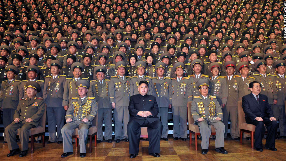 Kim Jong-un poses with North Korean military. (KCNA/Yonhap)