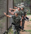 South Korean soldiers patrol along the coast of South Korea`s western island of Yeonpyeong, which borders North Korea, on Aug. 26, 2015. The South Korean military has reduced its military alert position since North Korea lifted the quasi-war state of its armed forces following the two Koreas` agreement the previous day on defusing tensions after four days of intensive inter-Korean talks. (Yonhap)