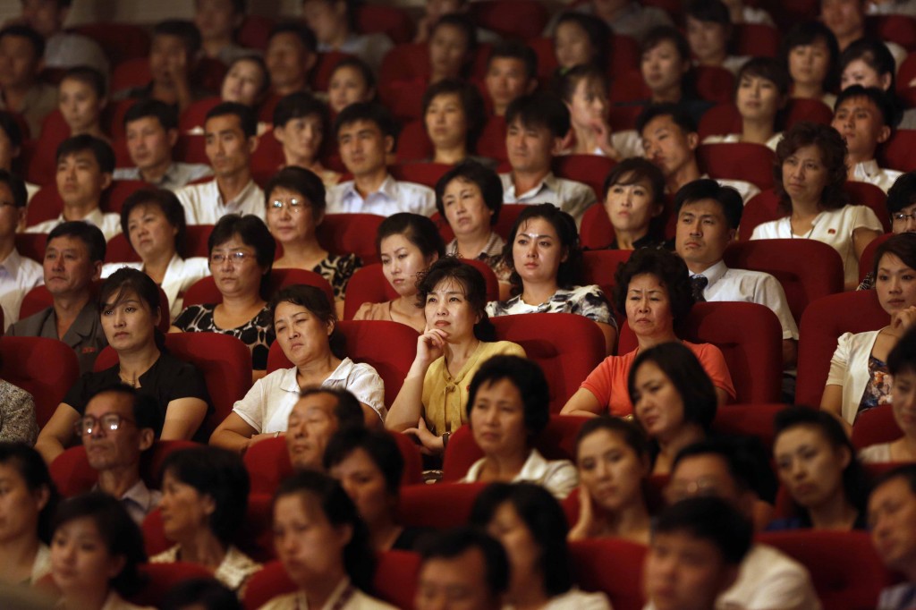 Spectators watch a performance by Slovenian rock band Laibach at a theater in Pyongyang, North Korea, Wednesday, Aug. 19, 2015. It's rare for North Korea to allow modern music from abroad to be performed inside the country. (AP Photo/Dita Alangkara)