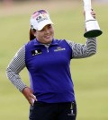 Inbee Park poses with the trophy after winning the Women's British Open on Sunday at the Turnberry course in Turnberry, Scotland. (AP Photo/Scott Heppell)