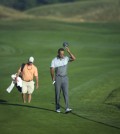 Tiger Woods walks up the first hole during a practice round for the PGA Championship golf tournament Tuesday, Aug. 11, 2015, at Whistling Straits in Haven, Wis. (AP Photo/Chris Carlson)