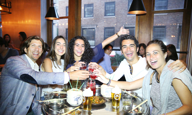 A group of New Yorkers dine and drink inside Soju Haus in Manhattan's Koreatown. (Chun Ji-hoon/Korea Times)