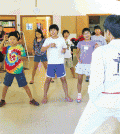 Korean Culture School students learn taekwondo under volunteers Saturday in Bethesda near Washington, D.C.