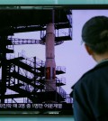 A South Korean man watches TV news program showing a file footage of the Unha rocket in North Korea, at Seoul Railway Station in Seoul, South Korea, Tuesday, Sept. 15, 2015. North Korea said Monday it is ready to launch satellites aboard long-range rockets to mark a key national anniversary next month, a move expected to rekindle animosities with its rivals South Korea and the United States. (AP Photo/ahn Young-joon)