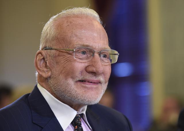 Buzz Aldrin, former NASA Astronaut and Apollo 11 Pilot, arrives on Capitol Hill in Washington to testify before the Senate subcommittee on Space, Science, and Competitiveness hearing on human exploration goals and commercial space competitiveness. (AP Photo/Susan Walsh)