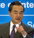 Chinese Foreign Minister Wang Yi speaks at an event to commemorate the 10th anniversary of the Sept. 19th joint statement agreed as part of the six-party talks on North Korea's nuclear program at the Diaoyutai State Guesthouse in Beijing, Saturday, Sept. 19, 2015. Yi said Saturday that the multilateral talks involving China, the United States, Russia, Japan, South Korea and North Korea are still the best way to address the nuclear issue on the Korean Peninsula. (AP Photo/Mark Schiefelbein)