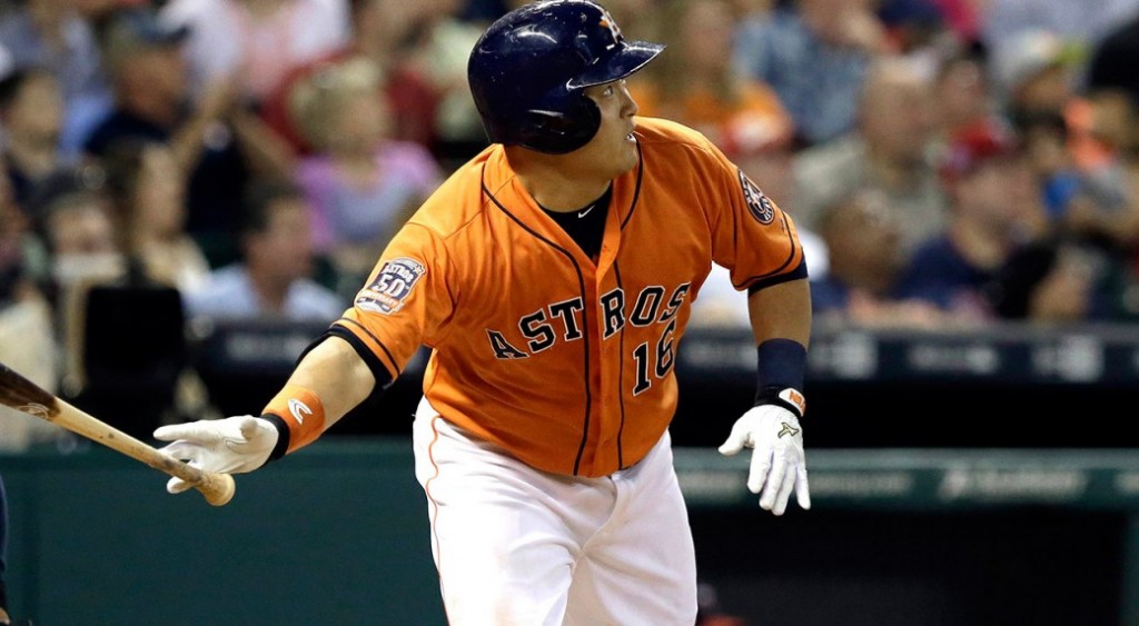 Houston Astros' Hank Conger watches the ball go over the wall for a grand slam against the Minnesota Twins in the fourth inning of a baseball game Friday, Sept. 4, 2015, in Houston. (AP Photo/Pat Sullivan)