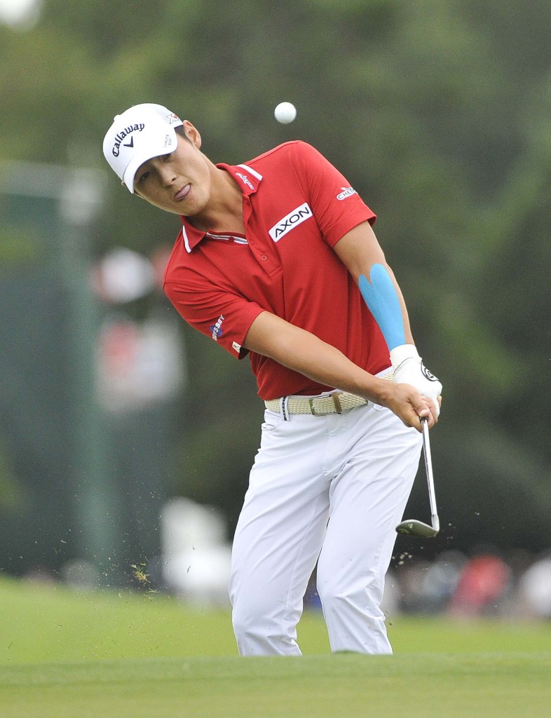 Danny Lee chips to the green on the 17th hole in the final round of the Tour Championship golf tournament at East Lake Golf Club, Sunday, Sept. 27, 2015, in Atlanta. Lee finished a three-way tie for second place with at 5 under par. (AP Photo/John Amis)