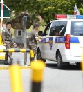 A police car enters a boot camp in the southeastern city of Daegu on Sept. 11, 2015, after reports whirled that a hand grenade explosion killed an Army sergeant and wounded two recruits during a training session at the camp. The military is investigating the exact cause of the explosion. (Yonhap)