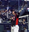 Hwang Jae-gyun, a third baseman for the Lotte Giants in South Korea’s top baseball league, watches a home run leave the park. (YouTube)