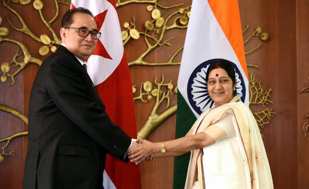 In this Monday, April 13, 2015 file photo, Indian Foreign Minister Sushma Swaraj, right, shakes hands with North Korea's Foreign Minister Ri Su Yong in New Delhi, India. Ties are warming between New Delhi and Pyongyang, with mineral-hungry India looking to boost trade while North Korea, facing sometimes-rocky relations with China, searches for new friends. The goodwill began earlier this year, when North Korea dispatched Ri on a three-day trip to India, just a few weeks before Prime Minister Narendra Modi flew to Seoul for meetings with South Korean President Park Geun-hye. (AP Photo/Manish Swarup, File)