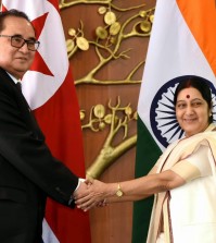 In this Monday, April 13, 2015 file photo, Indian Foreign Minister Sushma Swaraj, right, shakes hands with North Korea's Foreign Minister Ri Su Yong in New Delhi, India. Ties are warming between New Delhi and Pyongyang, with mineral-hungry India looking to boost trade while North Korea, facing sometimes-rocky relations with China, searches for new friends. The goodwill began earlier this year, when North Korea dispatched Ri on a three-day trip to India, just a few weeks before Prime Minister Narendra Modi flew to Seoul for meetings with South Korean President Park Geun-hye. (AP Photo/Manish Swarup, File)