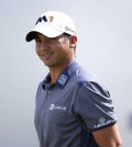 Jason Day, of Australia, smiles as he heads to the first hole during the final round of the BMW Championship golf tournament at Conway Farms Golf Club, Sunday, Sept. 20, 2015, in Lake Forest, Ill. (AP Photo/Charles Rex Arbogast)