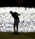 Jason Day, of Australia, hits his approach shot on the 15th fairway during the final round of the BMW Championship golf tournament at Conway Farms Golf Club, Sunday, Sept. 20, 2015, in Lake Forest, Ill. (AP Photo/Charles Rex Arbogast)