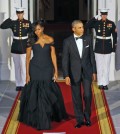 President Barack Obama, right, and first lady  Michelle Obama wait for the arrival of Chinese President Xi Jinping and his wife Peng Liyuan for a State Dinner at the White House in Washington, Friday, Sept. 25, 2015. (AP Photo/Steve Helber)