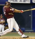 Park Byung-ho of the Nexen Heroes hits his 50th home run of the Korea Baseball Organization season against the NC Dinos in Changwon, South Korea, on Sept. 21, 2015. (Yonhap)