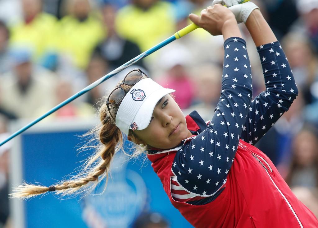 United States' Alison Lee tees off in the singles matches on Day3 of the Golf Solheim Cup in St.Leon-Rot, Germany, Sunday, Sept. 20, 2015.(AP Photo/Michael Probst)
