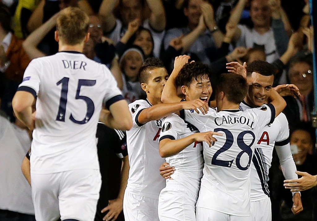 Tottenham’s Son Heung-Min, center, celebrates with teammates after scoring during the Europa League Group J soccer match between Tottenham Hotspur and Qarabag FK at the White Hart Lane stadium in London, England, Thursday, Sept. 17, 2015. (AP Photo/Frank Augstein)