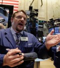 Trader Michael Milano works on the floor of the New York Stock Exchange, Tuesday, Sept. 1, 2015. More signs of weakness in China's economy are sending global stock markets sharply lower. (AP Photo/Richard Drew)