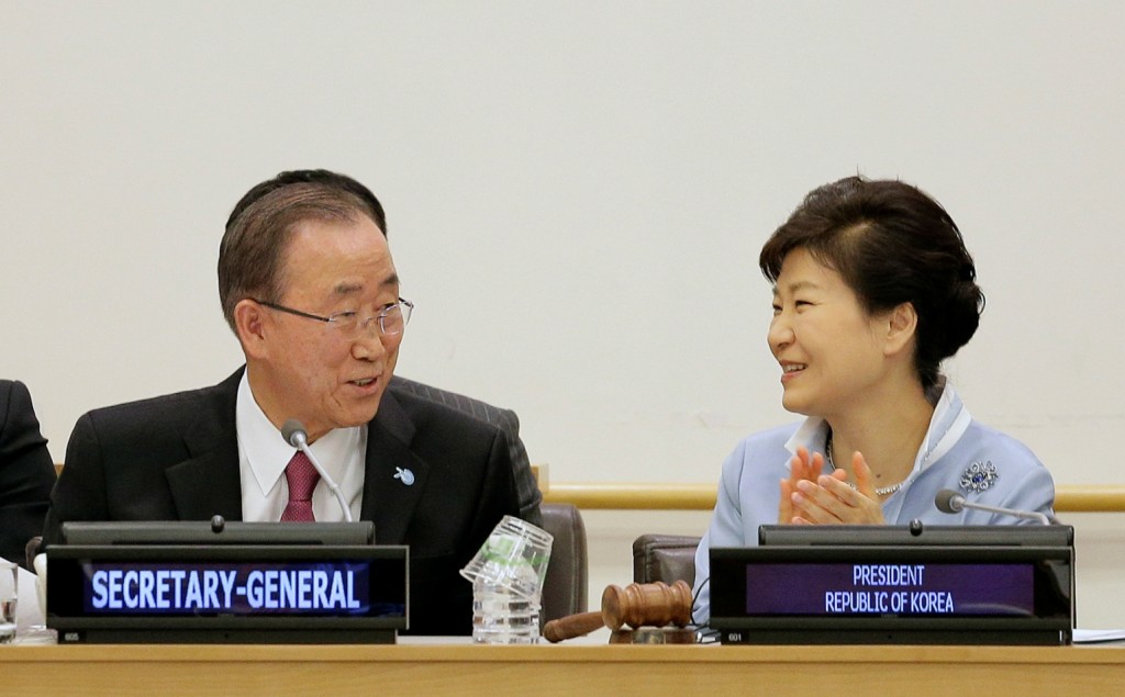 United Nations Secretary General Ban Ki-moon, left, talks with South Korea president Park Geun-hye during a conference on A New Rural Development Paradigm and the Inclusive Sustainable New Communities Model, Saturday, Sept. 26, 2015, at the United Nations headquarters. (AP Photo/Julie Jacobson)