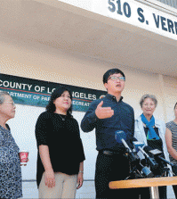 A group of Los Angeles Korean American non-profits hold a press conference Wednesday in front of Los Angeles County's Department of Parks and Recreation calling for a community center's inclusion in a new planned government building in Koreatown.