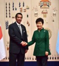 South Korean President Park Geun-hye, right, shakes hands with her Botswana counterpart Ian Khama before their summit at the presidential Blue House in Seoul Friday, Oct. 23, 2015. (Jung Yeon-je/Pool Photo via AP)