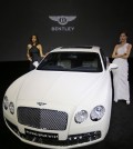 Models with a limited edition Flying Spur made for the Korean market during a sales event held at the Shilla Hotel, in Seoul, Tuesday. Bentley Korea unveiled the two Flying Spur luxury sedans created by designer Lee Sang-yup under its Mulliner bespoke service. (Yonhap)
