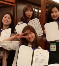 Four Duksung Women's University students pose with award certificates at the Sejong Hotel in Myeong-dong, central Seoul, Oct. 2, after being selected as an excellent team for the UNESCO Climate Change Youth Frontier Initiative. They include Hwang Nam-hee in the first row. Others are, from left in the second row, Park Si-hyun, Lee Han-nah, and Han Ji-hye. The team, named Limited Edition, launched an environmental campaign to promote using environment-friendly materials as cosmetic containers. (Courtesy of Duksung Women's University)