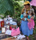 Maria del Refugio Ruiz Bravo, 86, sets out to dry personal belongings that were soaked by Hurricane Patricia in La Fortuna, Mexico. (Rebecca Blackwell/Associated Press)