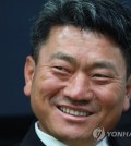 South Korean golfer Choi Kyoung-ju, affectionately known as K.J. Choi, smiles during an interview with Yonhap News Agency in Seoul on Oct. 2, 2015. (Yonhap)