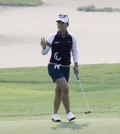 Lydia Ko of New Zealand reacts after sinking a birdie putt on the first green during the second round of the KEB Hana Bank Championship golf tournament at Sky72 Golf Club in Incheon, South Korea, Friday, Oct. 16, 2015. (AP Photo/Ahn Young-joon)