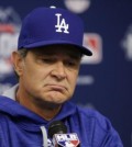 In this Monday, Oct. 12, 2015, file photo, Los Angeles Dodgers manager Don Mattingly speaks during a news conference before Game 3 of baseball’s National League Division Series against the New York Mets in New York. A person familiar with the decision tells The Associated Press that Don Mattingly is out as manager of the Dodgers. The person spoke on the condition of anonymity Thursday, Oct. 22, 2015, because the team has not announced his departure. (AP Photo/Frank Franklin II, File)