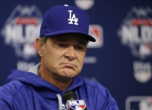 In this Monday, Oct. 12, 2015, file photo, Los Angeles Dodgers manager Don Mattingly speaks during a news conference before Game 3 of baseball’s National League Division Series against the New York Mets in New York. A person familiar with the decision tells The Associated Press that Don Mattingly is out as manager of the Dodgers. The person spoke on the condition of anonymity Thursday, Oct. 22, 2015, because the team has not announced his departure. (AP Photo/Frank Franklin II, File)