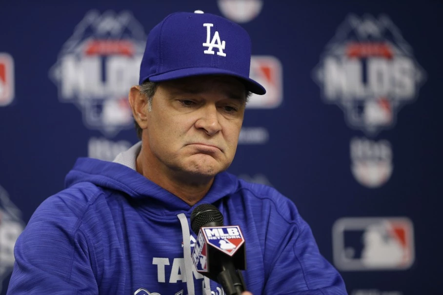 In this Monday, Oct. 12, 2015, file photo, Los Angeles Dodgers manager Don Mattingly speaks during a news conference before Game 3 of baseball’s National League Division Series against the New York Mets in New York. A person familiar with the decision tells The Associated Press that Don Mattingly is out as manager of the Dodgers. The person spoke on the condition of anonymity Thursday, Oct. 22, 2015, because the team has not announced his departure. (AP Photo/Frank Franklin II, File)