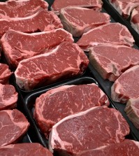 In this Jan. 18, 2010 file photo, steaks and other beef products are displayed for sale at a grocery store in McLean, Va. The meat industry is seeing red over the dietary guidelines. The World Health Organization’s cancer agency says Monday Oct.26, 2015 that processed meats such as ham and sausage can lead to colon and other cancers, and red meat is probably cancer-causing as well. (AP Photo/J. Scott Applewhite, File)