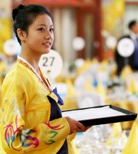 A North Korean hostess has gathered a bit of attention during the three-day reunion event. (Yonhap)