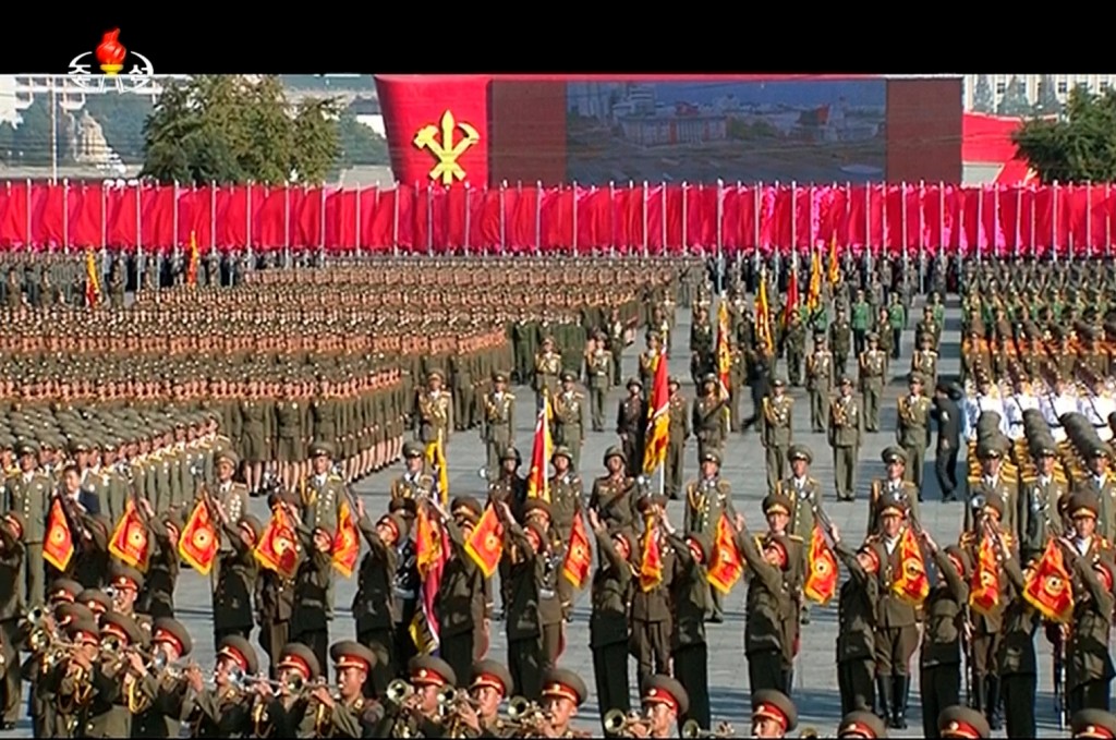 In this image made from video, North Korean military personnel perform at the Kim Il Sung Square during the ceremony to mark the 70th anniversary of the country's ruling party in Pyongyang, Saturday, Oct. 10, 2015. North Korean leader Kim Jong Un declared Saturday that his country was ready to stand up to any threat posed by the United States as he spoke at a lavish military parade to mark the 70th anniversary of the North's ruling party and trumpet his third-generation leadership. (KRT via AP Video)