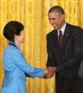 President Barack Obama and South Korean President Park Geun-hye shakes hands following their joint news conference in the East Room of the White House in Washington, Friday, Oct. 16, 2015. (AP Photo/Pablo Martinez Monsivais)