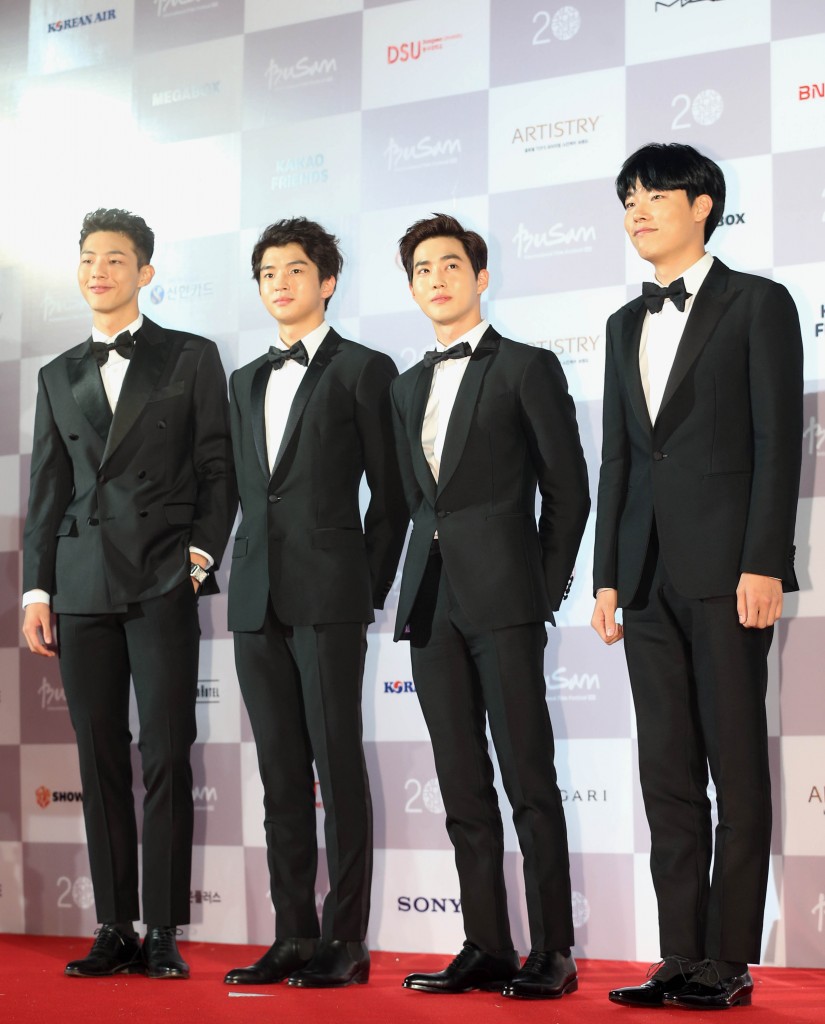 South Korean actors Kim Hee-chan, Ji-soo, EXO leader Suho and Choi Jung-yeol, left to right, attend the red carpet opening of the Busan International Film Festival Thursday. (Yonhap)