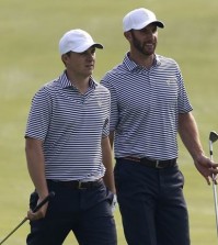 United States' Jordan Spieth, left, walks with teammate Dustin Johnson during their final practice round ahead of the Presidents Cup golf tournament at the Jack Nicklaus Golf Club Korea, in Incheon, South Korea, Wednesday, Oct. 7, 2015.(AP Photo/Lee Jin-man)