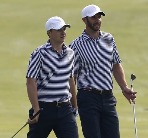 United States' Jordan Spieth, left, walks with teammate Dustin Johnson during their final practice round ahead of the Presidents Cup golf tournament at the Jack Nicklaus Golf Club Korea, in Incheon, South Korea, Wednesday, Oct. 7, 2015.(AP Photo/Lee Jin-man)