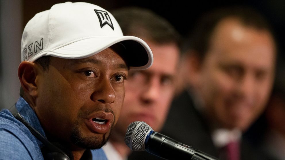 Tiger Woods responds to a question during a press conference to launch the Bridgestone America's Golf Cup in Mexico City, Tuesday, Oct. 20, 2015. Woods withdrew from the Bridgestone America's Golf Cup and two other events he had planned to play this year following back surgery. He isn't expected to return to the tour until January at the earliest. (AP Photo/Rebecca Blackwell)