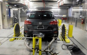 A Volkswagen Touareg diesel is tested in the Environmental Protection Agency's cold temperature test facility, Tuesday, Oct. 13, 2015, in Ann Arbor, Mich. Volkswagen has disclosed to U.S. regulators that there’s additional suspect software in its 2016 diesel models that would potentially help their exhaust systems run cleaner during government tests. (AP Photo/Carlos Osorio)