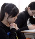 Students take the CSAT at a high school in Seoul, November 2014. (Korea Times file)