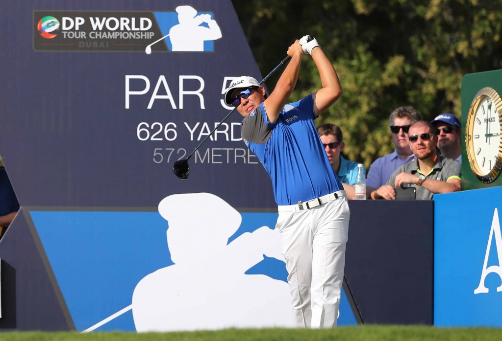 An Byeong-hun of South Korea tees off on 14th hole during the round one of DP World Tour Championship golf tournament in Dubai, United Arab Emirates, Thursday, Nov. 19, 2015. (AP Photo/Kamran Jebreili)