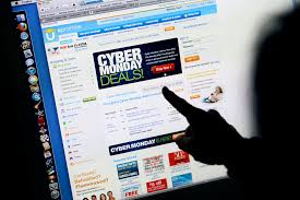 FILE - In this Monday, Nov. 29, 2010, file photo, a consumer looks at Cyber Monday sales on her computer at her home in Palo Alto, Calif. Retailers are rolling out online deals on so-called "Cyber Monday." But now that shoppers are online all the time anyway, the 10-year-old shopping holiday is losing some of its luster. (AP Photo/Paul Sakuma, File)