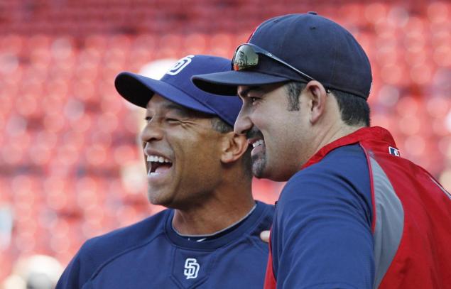 Dave Roberts, left, will replace Don Mattingly as the Dodgers' manager. (Charles Krupa/AP Photo)