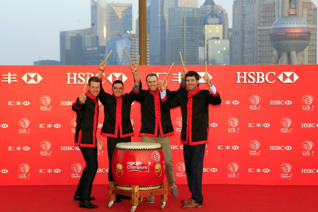 From left to right, Tennis players Henrik Stenson, Rickie Fowler, Jordan Spieth, Bubba Watson, hold drum sticks for photo during the HSBC Champions golf tournament photocall in Shanghai, China Thursday Nov.3, 2015. (AP Photo)